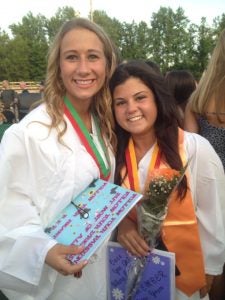 two girls at high school graduation