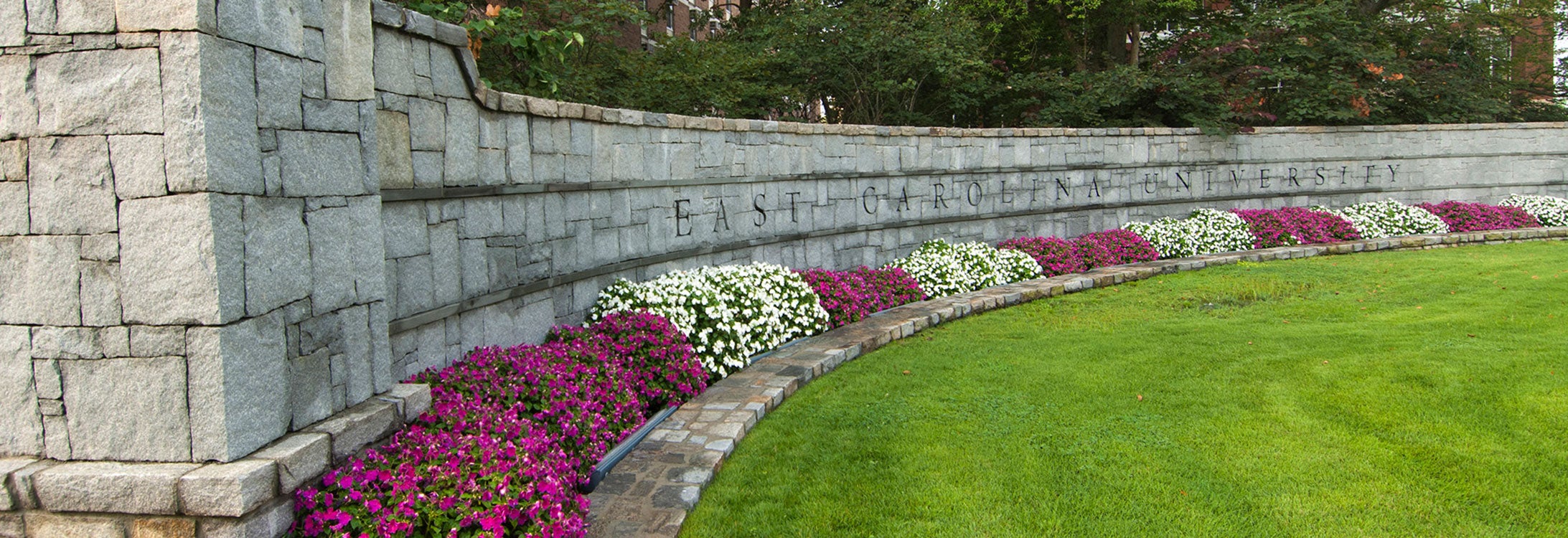 ECU signage with flowers