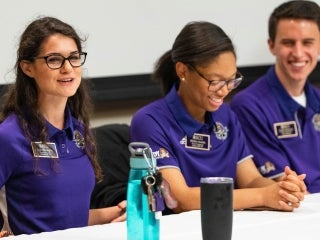 Student volunteers on a panel