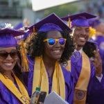 Smiling students at ECU Spring Commencement